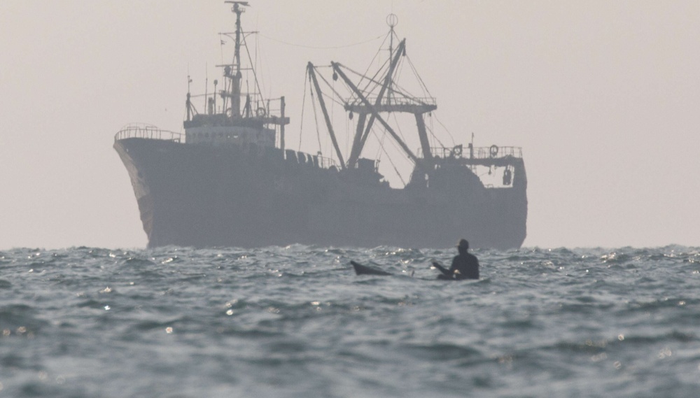 Canoe and trawler 1